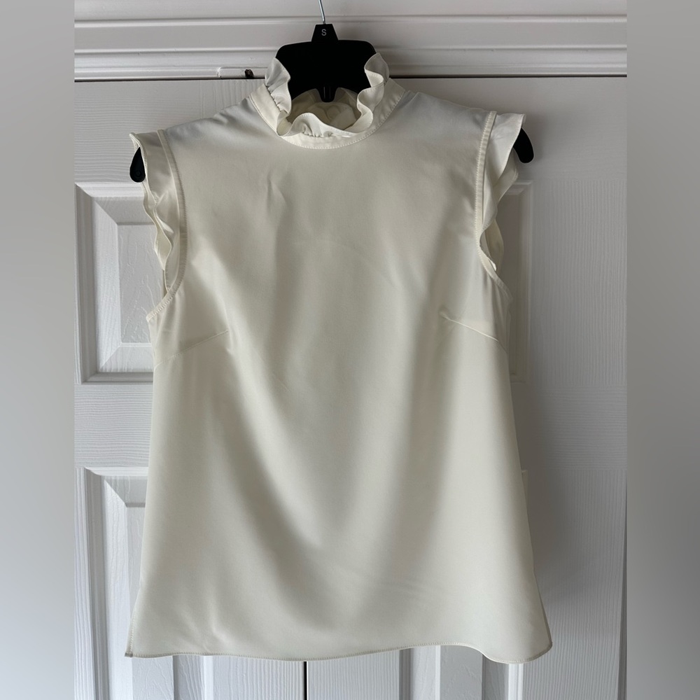 Julie Brown NYC, Ivory, Ruffle Neck& Cap Sleeve
Sz 2
Excellent Condition